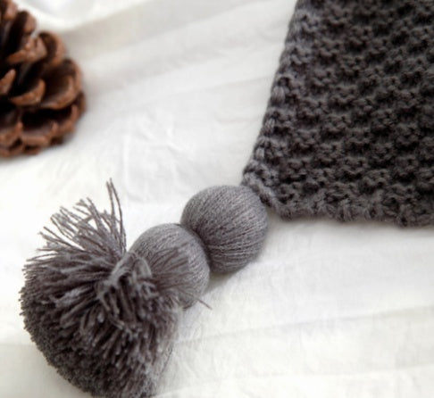 Plaid tricot nordique à pompons – photo 4